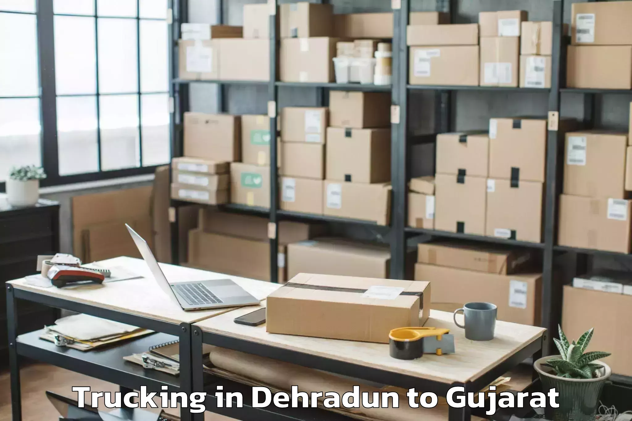 Expert Dehradun to Surendranagar Trucking